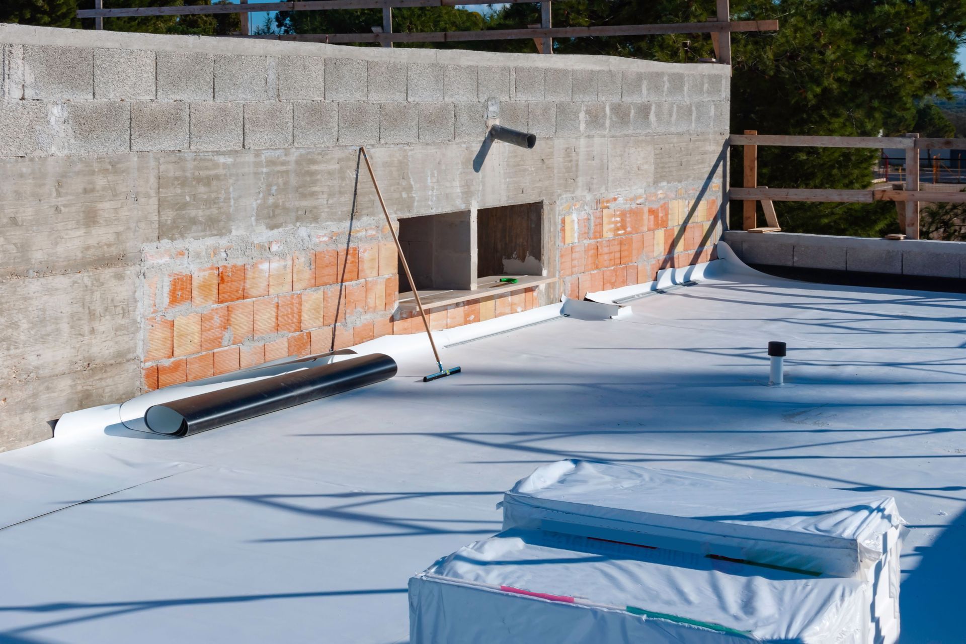 TPO roofing membrane installation on a commercial flat roof in South Florida